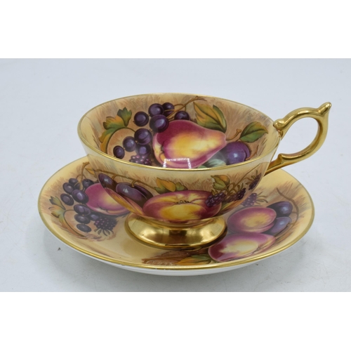 51 - Aynsley Orchard Gold cup and saucer both signed by N Brunt (2). In good condition with no obvious da... 