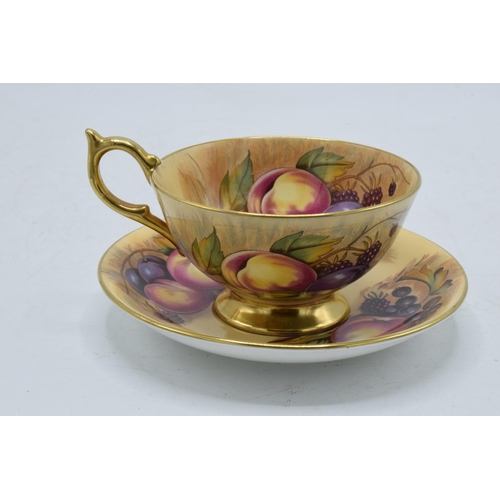 51 - Aynsley Orchard Gold cup and saucer both signed by N Brunt (2). In good condition with no obvious da... 