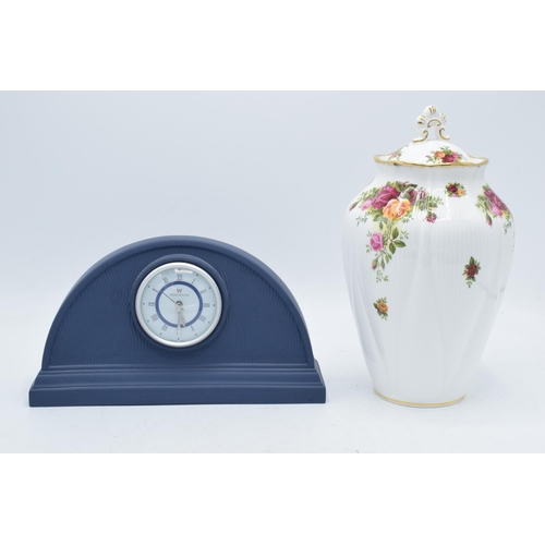 72 - A Wedgwood dark blue Jasperware mantle clock together with a large Royal Albert Old Country Roses li... 