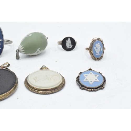 75 - An interesting collection of Wedgwood Jasperware jewellery all in silver mounts to include pendants ... 