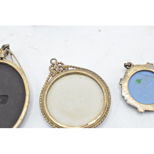 75 - An interesting collection of Wedgwood Jasperware jewellery all in silver mounts to include pendants ... 