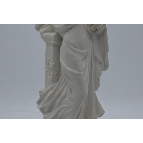 76 - An unusual Coalport figure of a robed lady playing the harp in a Parian / Wedgwood style. 27cm tall.... 