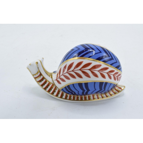 100B - Royal Crown Derby paperweight in the form of a snail. First quality with ceramic stopper. In good co... 