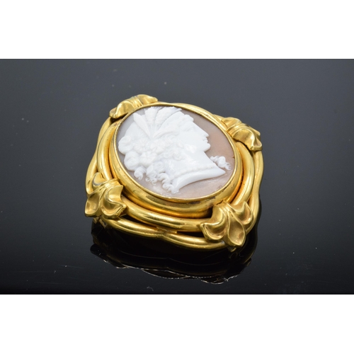 221H - Victorian gilt metal framed shell cameo depicting a classical head figure. 5cm tall.