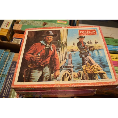 348 - A large collection of Victory and similar childrens wooden jigsaw puzzles from the mid 20th century ... 