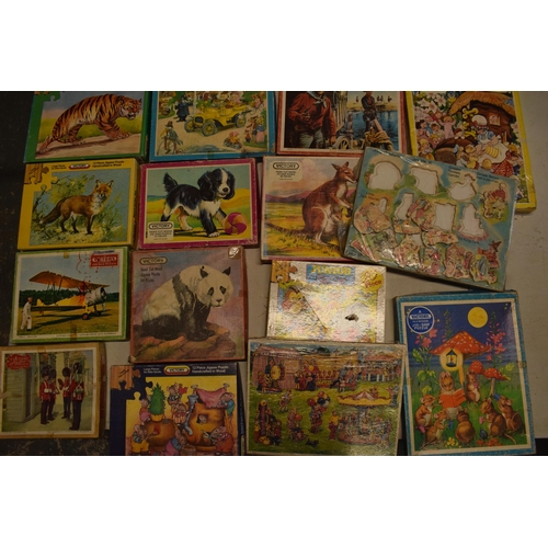 348 - A large collection of Victory and similar childrens wooden jigsaw puzzles from the mid 20th century ... 