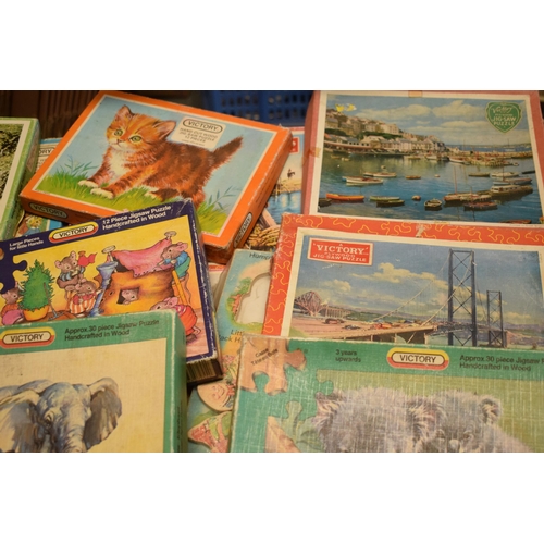 348 - A large collection of Victory and similar childrens wooden jigsaw puzzles from the mid 20th century ... 