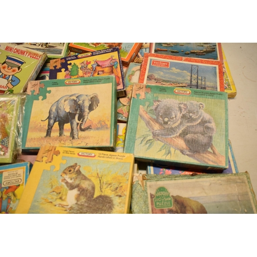 348 - A large collection of Victory and similar childrens wooden jigsaw puzzles from the mid 20th century ... 