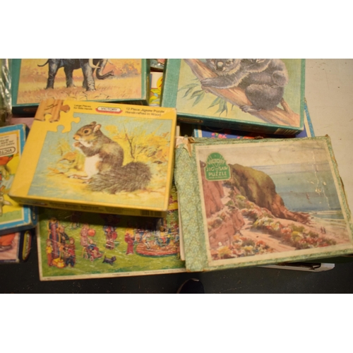 348 - A large collection of Victory and similar childrens wooden jigsaw puzzles from the mid 20th century ... 