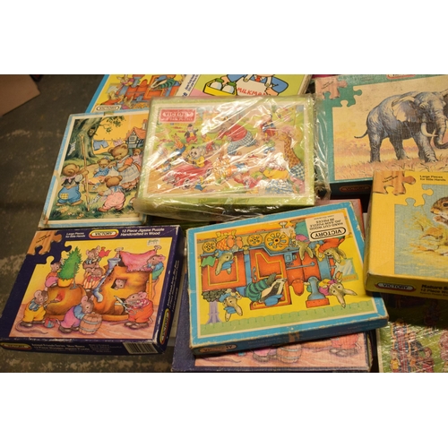 348 - A large collection of Victory and similar childrens wooden jigsaw puzzles from the mid 20th century ... 