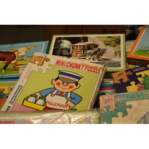 348 - A large collection of Victory and similar childrens wooden jigsaw puzzles from the mid 20th century ... 