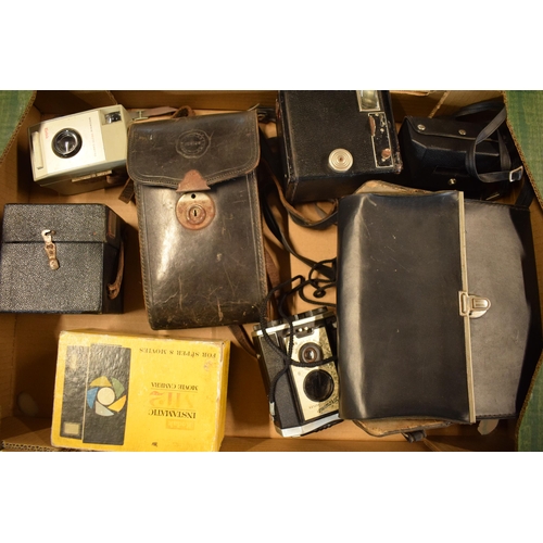 358 - A collection of cameras and camera equipment to include a Houghton camera, various Kodak Brownies, C... 