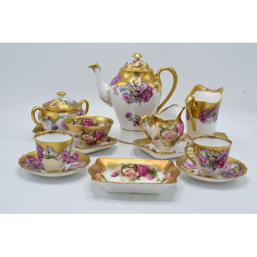 48 - Royal Chelsea English Bone China Golden Rose tea ware to include a coffee pot, 2 cups and saucers, 2... 