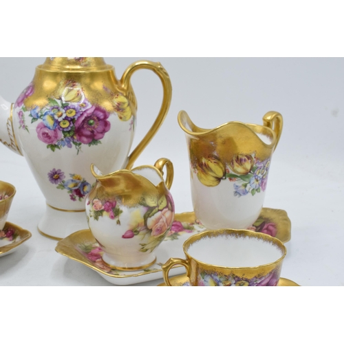 48 - Royal Chelsea English Bone China Golden Rose tea ware to include a coffee pot, 2 cups and saucers, 2... 