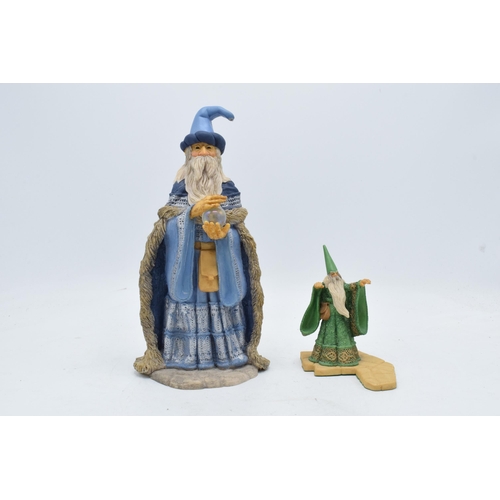 60 - A pair of Hap Henrikson resin Wizards and Dragons figure to include a pair of wizards (2). Tallest 2... 