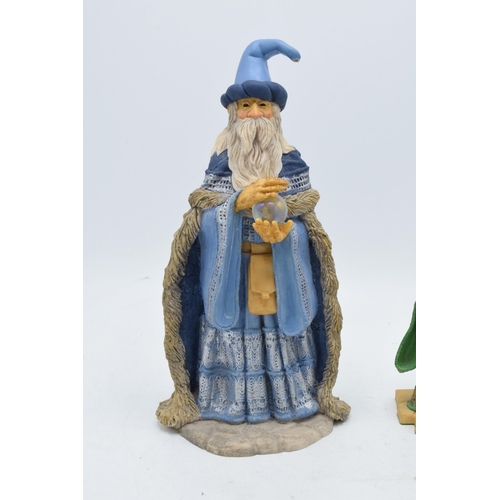 60 - A pair of Hap Henrikson resin Wizards and Dragons figure to include a pair of wizards (2). Tallest 2... 