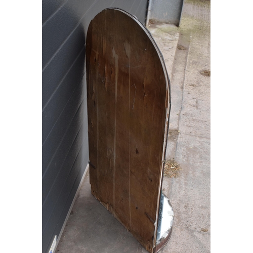 363 - A large domed mirror with mirrored shelf with decoration to main panel. 98cm tall.