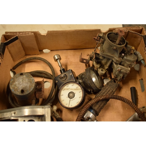 369 - A collection of vintage motorbike and similar spares / parts to include a Smiths gauge, lights, Merc... 