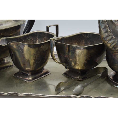 370 - A silver-plated 6 piece tea set to include a teapot, coffee pot, sugar tongs, milk, sugar and tray (... 