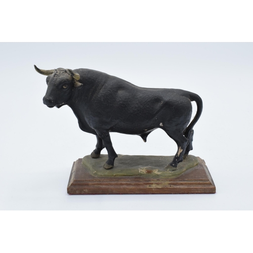 380 - An unusual 20th century cast plaster figure of an Aberdeen Angus Bull with signature to verso. Some ... 