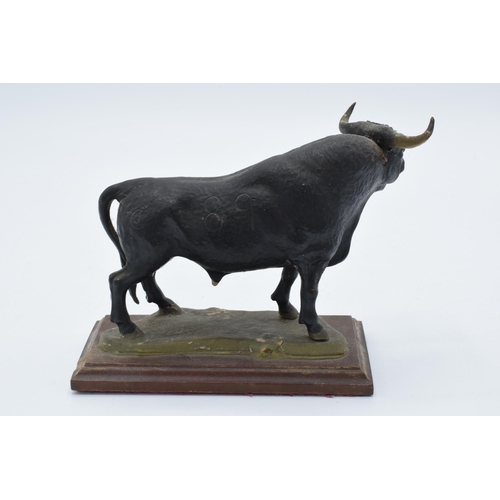 380 - An unusual 20th century cast plaster figure of an Aberdeen Angus Bull with signature to verso. Some ... 