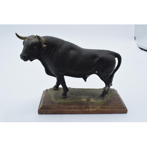 380 - An unusual 20th century cast plaster figure of an Aberdeen Angus Bull with signature to verso. Some ... 