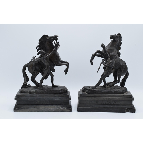 382 - A late 19th century / early 20th century pair of bronze Marley Horses, Africa and Europa with each b... 