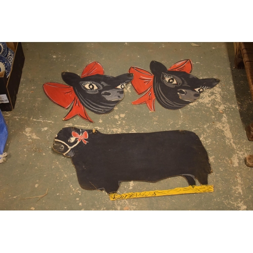 392 - An interesting trio of hand-painted butcher's signs with Aberdeen Angus cattle (3).