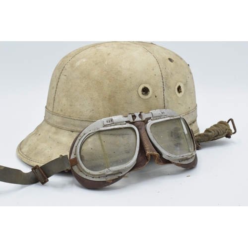 396 - A vintage helmet 'The Corker Mark II' made by J.Compton Sons & Webb Ltd together with vintage goggle... 