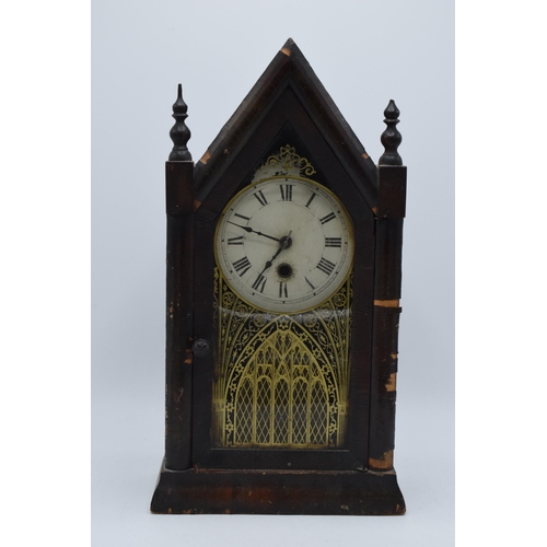 399 - An American wooden Steeple mantle clock by Jerome & Co with Gothic design. Untested though key prese... 