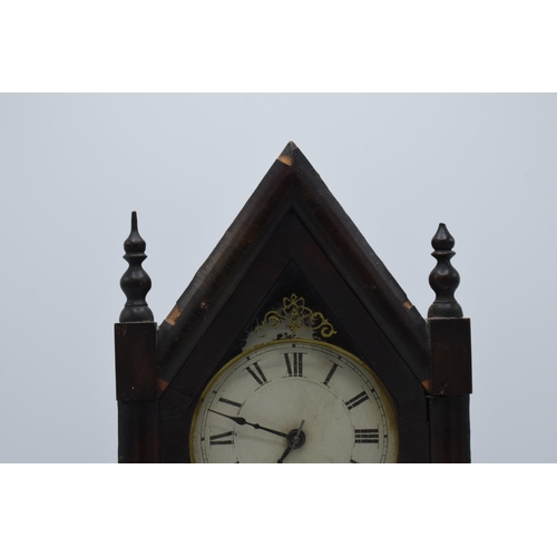 399 - An American wooden Steeple mantle clock by Jerome & Co with Gothic design. Untested though key prese... 