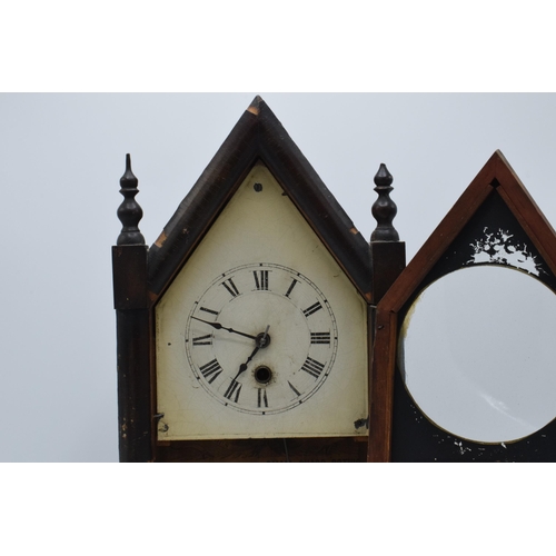 399 - An American wooden Steeple mantle clock by Jerome & Co with Gothic design. Untested though key prese... 