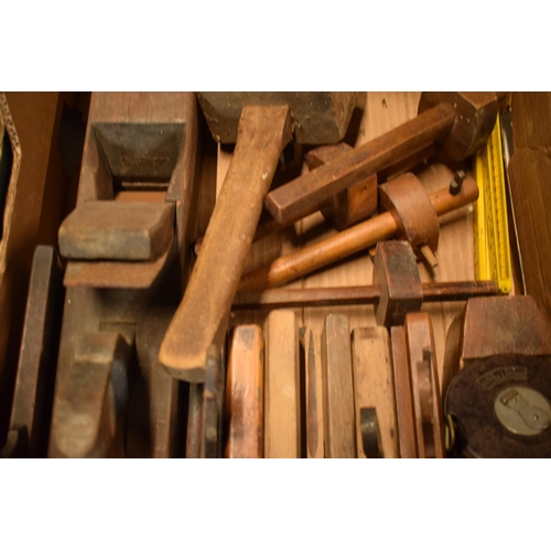 406 - A collection of vintage tools to include planes, tape measures, gauges, a mallet, vintage saws etc (... 