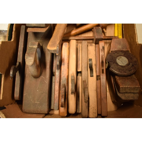 406 - A collection of vintage tools to include planes, tape measures, gauges, a mallet, vintage saws etc (... 