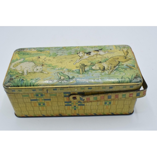 415 - A vintage early to mid 20th century French tin depicting a animals playing. 19cm wide.