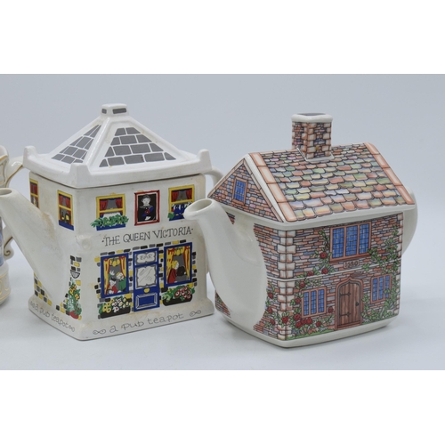 65A - A trio of teapots to include Sadler examples 17th Century Cottage, Band Stand and Wade English Life ... 