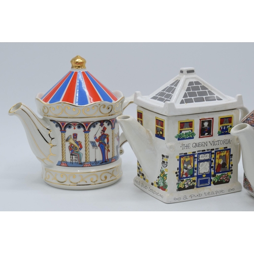 65A - A trio of teapots to include Sadler examples 17th Century Cottage, Band Stand and Wade English Life ... 