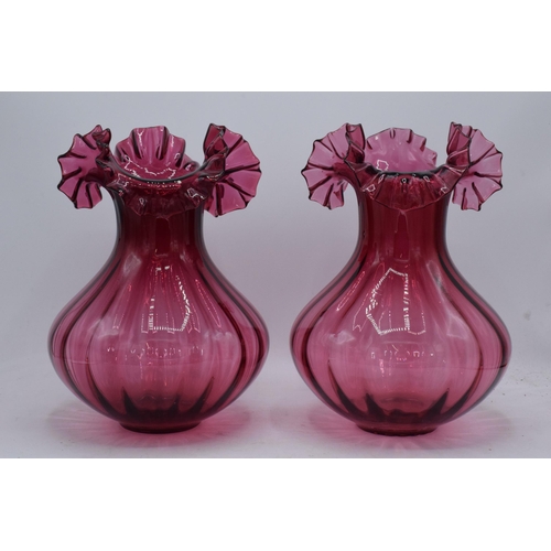 68 - A pair of large vintage cranberry glass low-shouldered baluster vases with shaped rims (2). 28cm tal... 