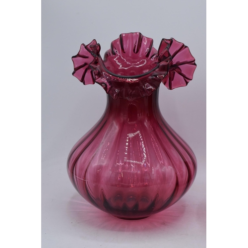 68 - A pair of large vintage cranberry glass low-shouldered baluster vases with shaped rims (2). 28cm tal... 