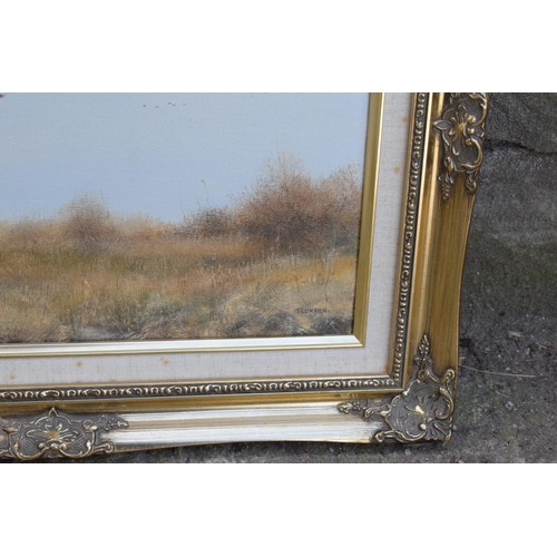 349B - T Lukkien oil on canvas in gilt frame of mallards in flight over marshes. 53 x 43cm inc frame.