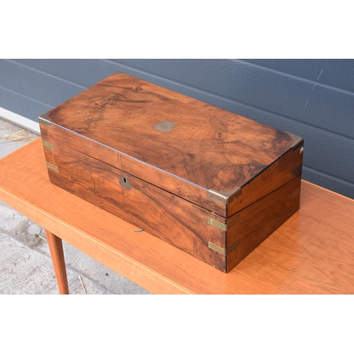 417 - 19th century brass bound writing slope with leather insets and glass jars and brass escutcheon. 51x2... 