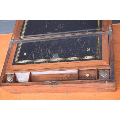 417 - 19th century brass bound writing slope with leather insets and glass jars and brass escutcheon. 51x2... 