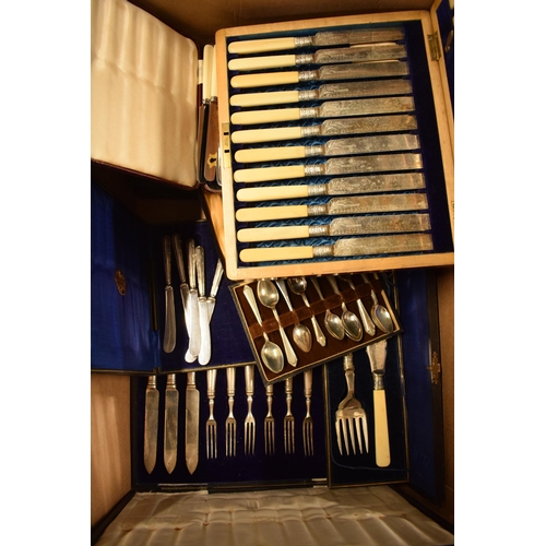 424 - A collection of silver plated cutlery sets to include 2 cased silver-handled sets amongst the plated... 