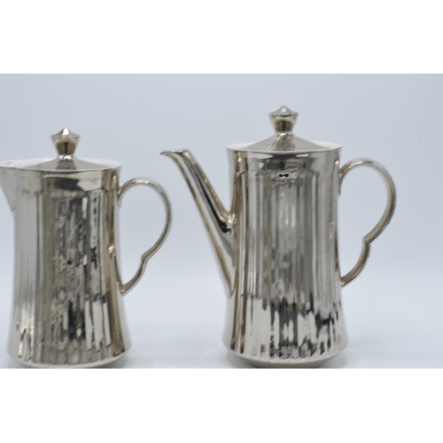 60A - A pair of Royal Worcester silver pottery tea and coffee pots (2). In good condition with no obvious ... 