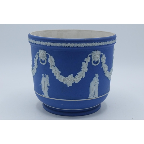 60C - Wedgwood dip blue Jasperware jardinière. 16.5cm tall. In good condition with no obvious damage or re... 