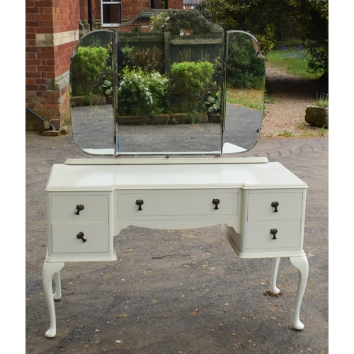 360 - An early 20th century wooden dressing table with folding mirrors on cabriole-style legs painted whit... 