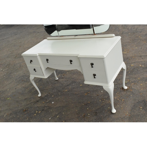 360 - An early 20th century wooden dressing table with folding mirrors on cabriole-style legs painted whit... 