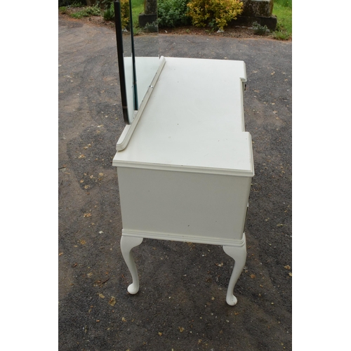 360 - An early 20th century wooden dressing table with folding mirrors on cabriole-style legs painted whit... 