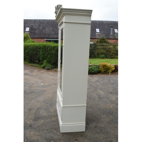 428 - A painted white wooden Edwardian wardrobe with carved decoration and mirrored door. 115 x 54 x 227cm... 