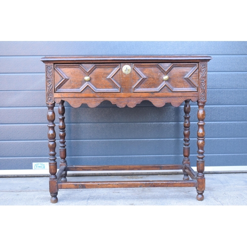 431 - A late 19th century / early 20th century oak side table with single frieze drawer and carved decorat... 